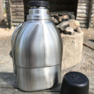 Ståltermos med kokkärl och kompass Ståltermos med kokkärl och kompass