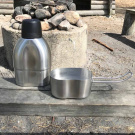 Ståltermos med kokkärl och kompass Ståltermos med kokkärl och kompass